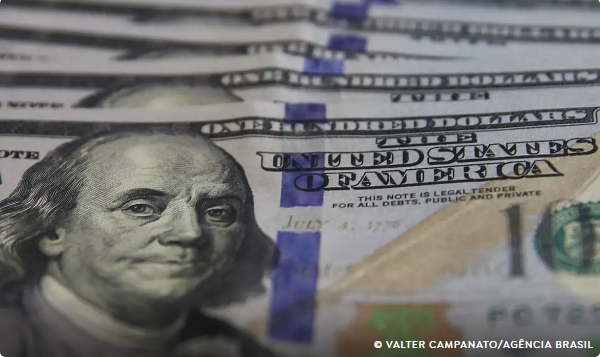 Dólar cai para R$ 6,04 com inflação moderada nos EUA